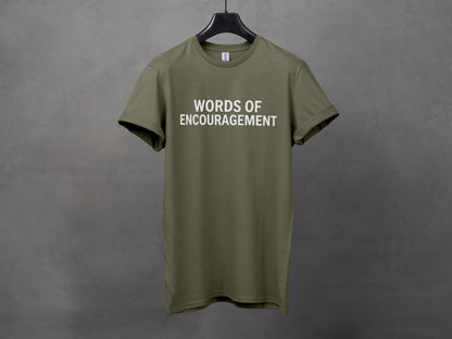 Olive green t-shirt with white text "WORDS OF ENCOURAGEMENT".