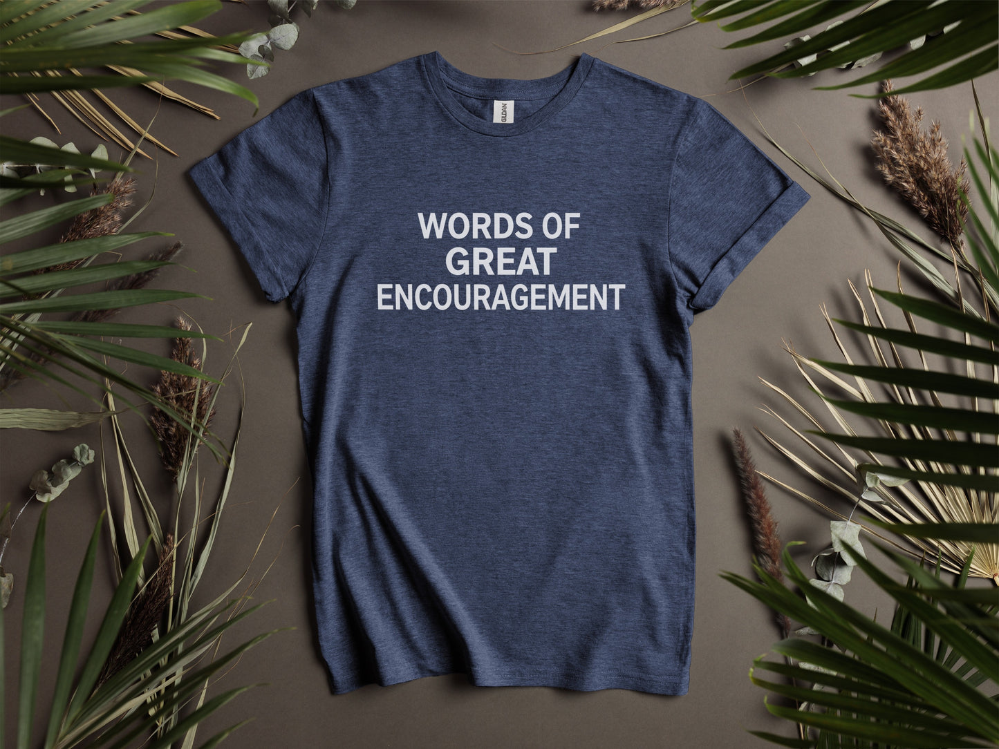 Navy t-shirt with white text reading "WORDS OF GREAT ENCOURAGEMENT".