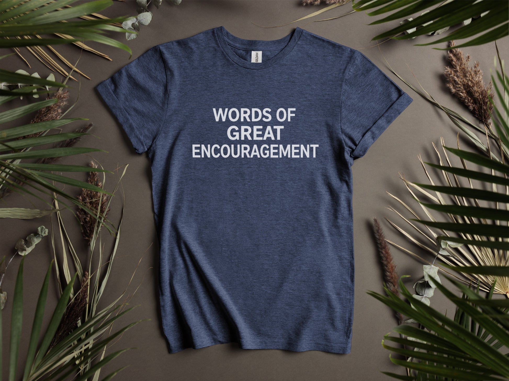 Navy t-shirt with white text reading "WORDS OF GREAT ENCOURAGEMENT".
